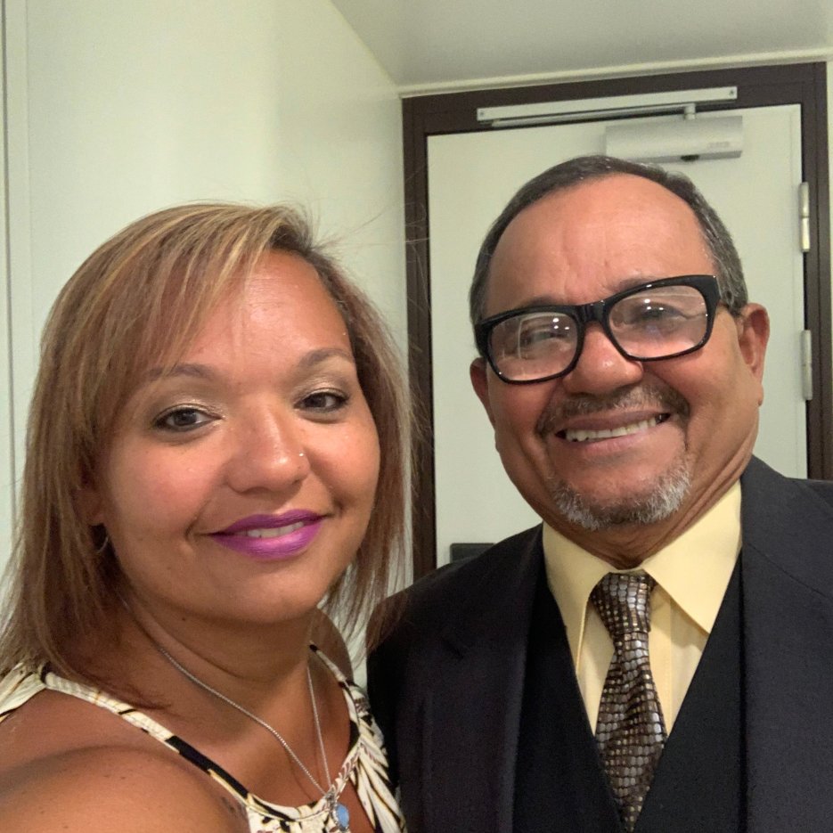 Caregiver Yvonne Quinones-Reyes posing for a picture with her father