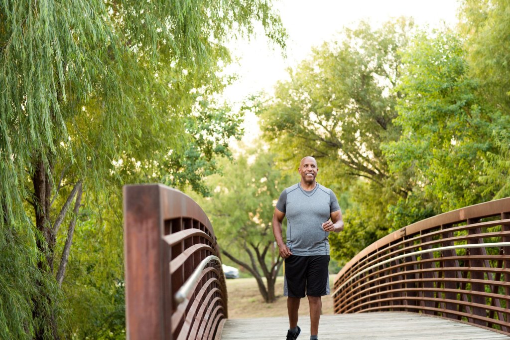 A caregiver going for a jog on a beautiful sunny day