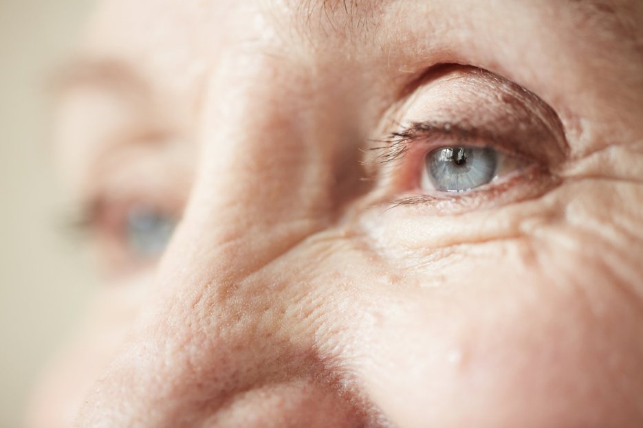 Close-up of an elderly person's eye, illustrating the connection between eye health and Alzheimer's detection