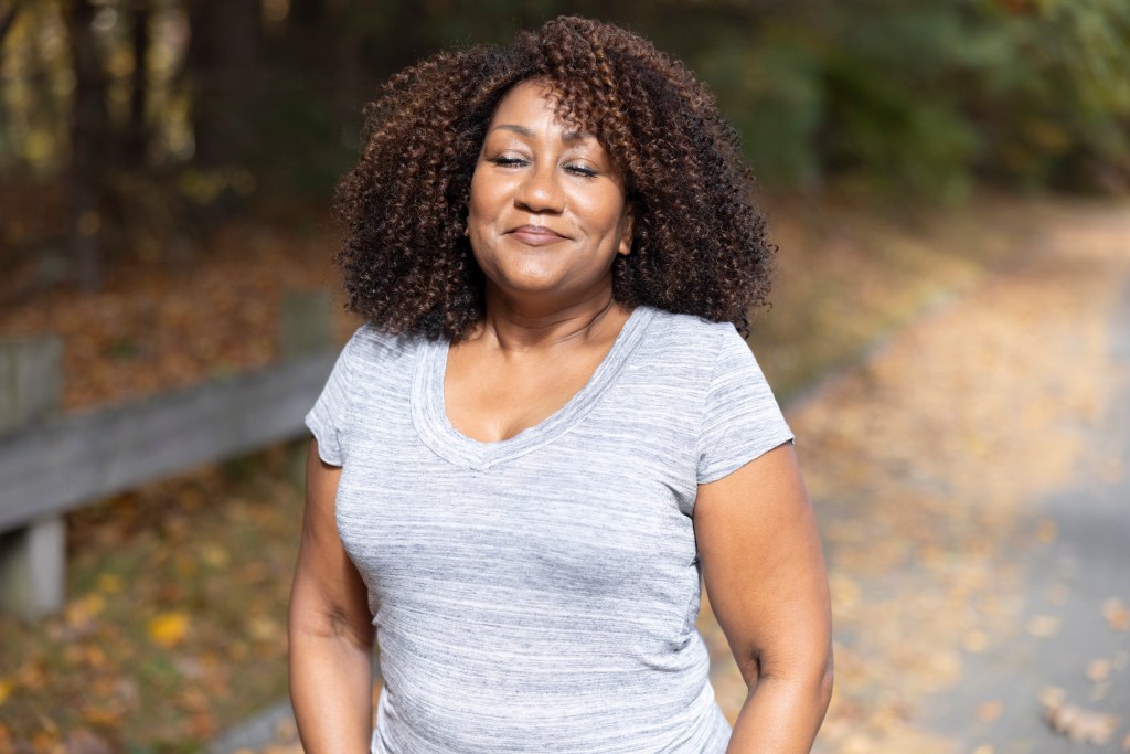 A family caregiver enjoying a peaceful moment of self-care.