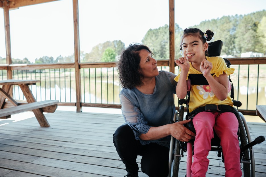 Yesenia and her daughter Miki share a family moment. Yesnia is Miki's caregiver.
